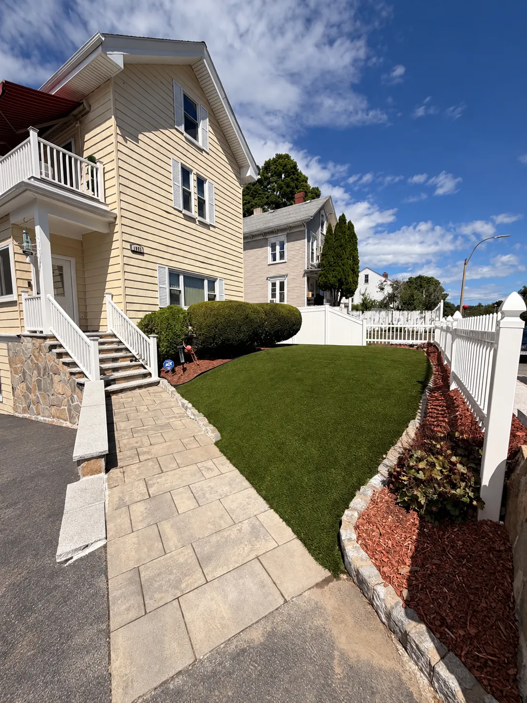 Front yard and paver entrance