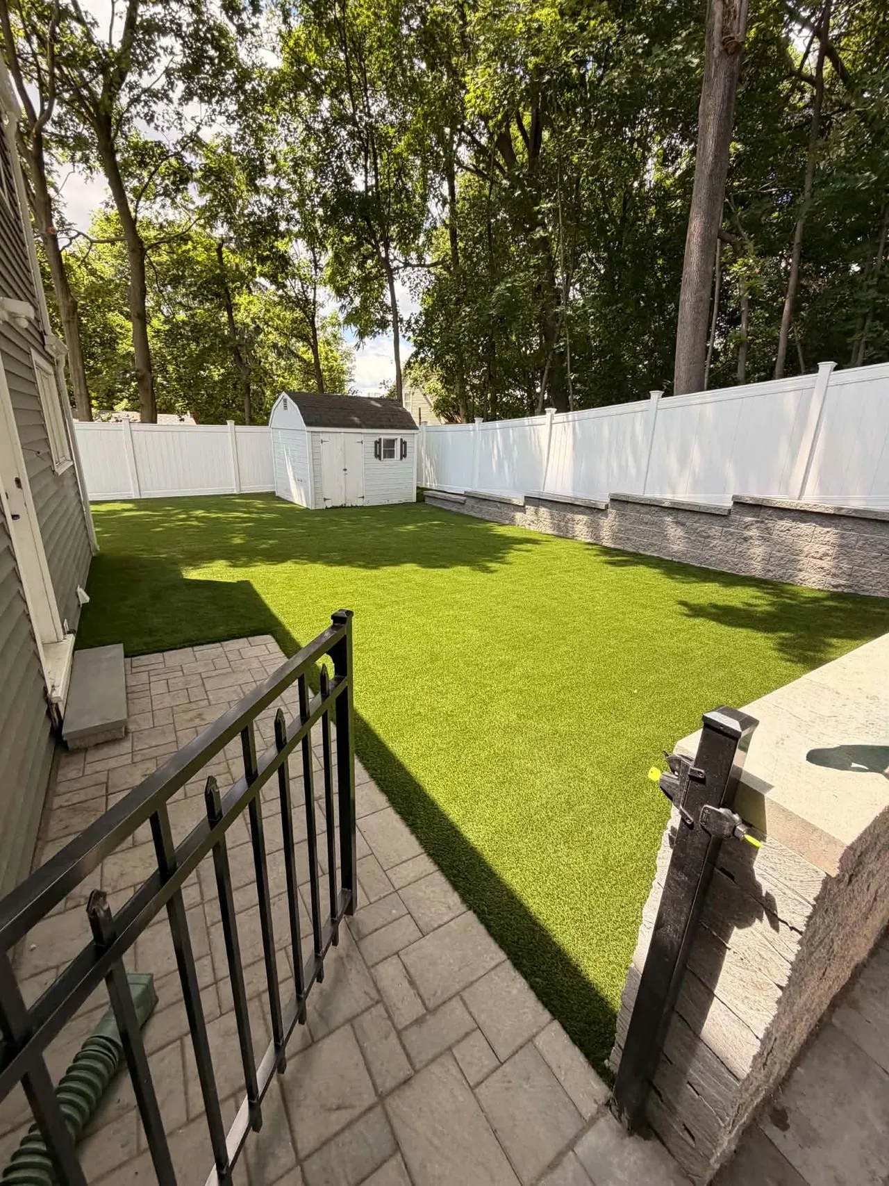 Finished lawn with hardscape transitions