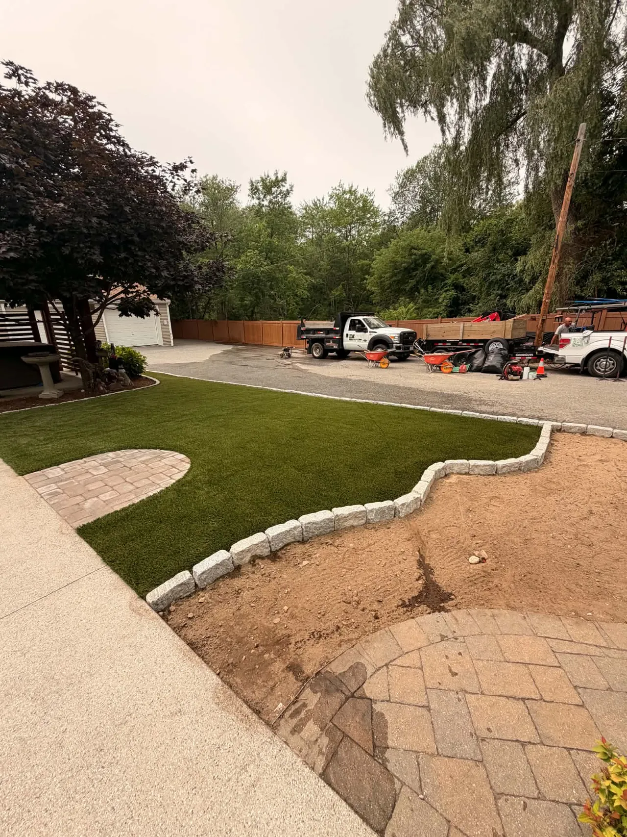 Installed turf with surrounding work in progress